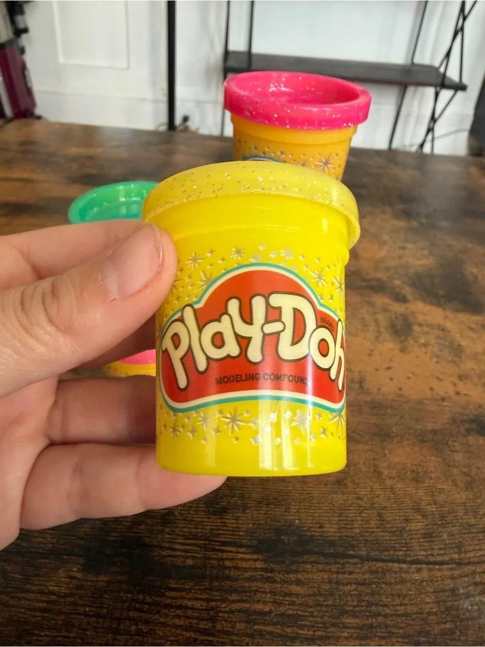 Play-Doh small Yellow with Pink, Teal, Purple, and Green Lids comes with all